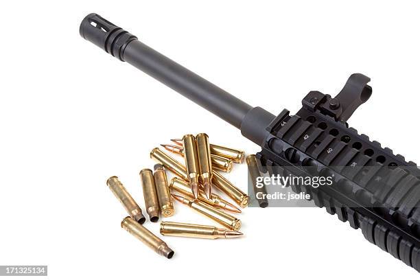 rifle barrel with loose bullets and used casings - cartridge stock pictures, royalty-free photos & images