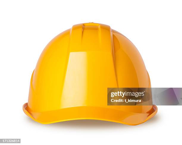 cappello duro giallo su bianco con percorso clip - elmetto foto e immagini stock