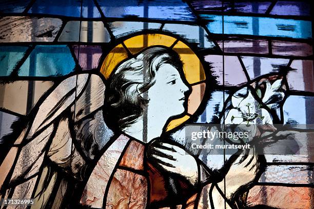 stained glass window in a cathedral - stained glass angel stock pictures, royalty-free photos & images
