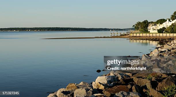 sunrise over hallock bay - rip rap stock pictures, royalty-free photos & images