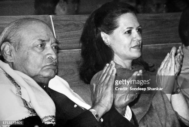 Prime Minister Narsimha Rao with Congress leader Sonia Gandhi applause during a function in New Delhi on January 27, 1995.
