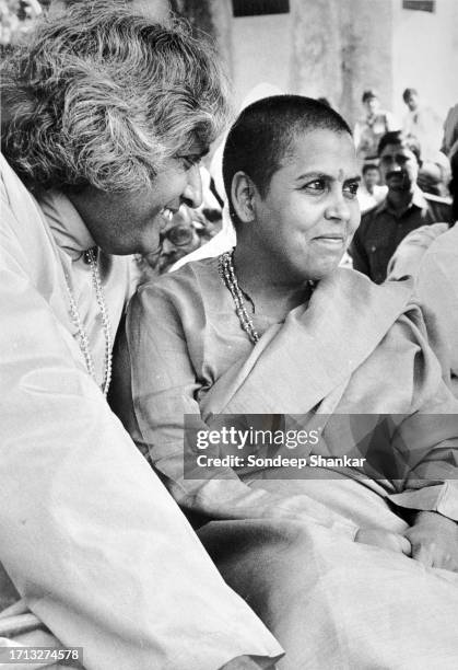 Bhartiya Janta Party leader Uma Bharti with religious leader Swami Dharmendra Acharya at a public meeting at the Hindu holy city of Ayodhya on...