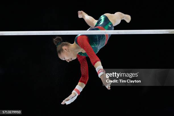 October 02: Kaylia Nemour of Algeria performs her routine on the uneven bars during Women's Qualification at the Artistic Gymnastics World...