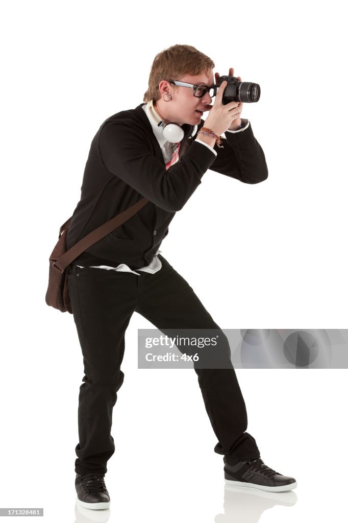 Man taking a picture with camera