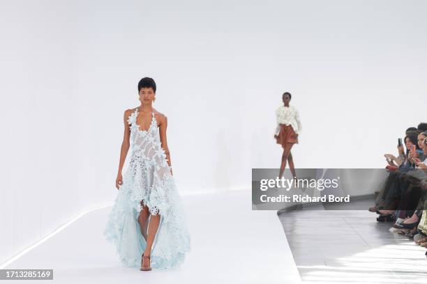 Model walks the runway during the Zimmermann Womenswear Spring/Summer 2024 show at palais de Tokyo as part of Paris Fashion Week on October 02, 2023...