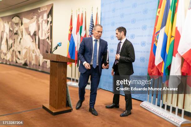 Israel's Ambassador to the U.N. Gilad Erdan exits the podium after speaking to reporters during a stakeout before the United Nations Security Council...