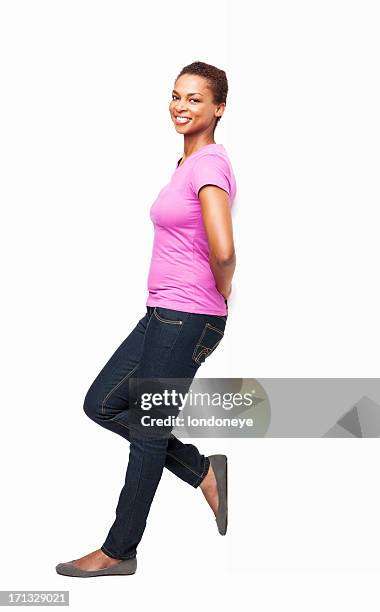 african american woman leaning in casuals - isolated - leaning stock pictures, royalty-free photos & images