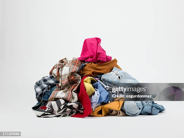 piles of clothes - kläder bildbanksfoton och bilder