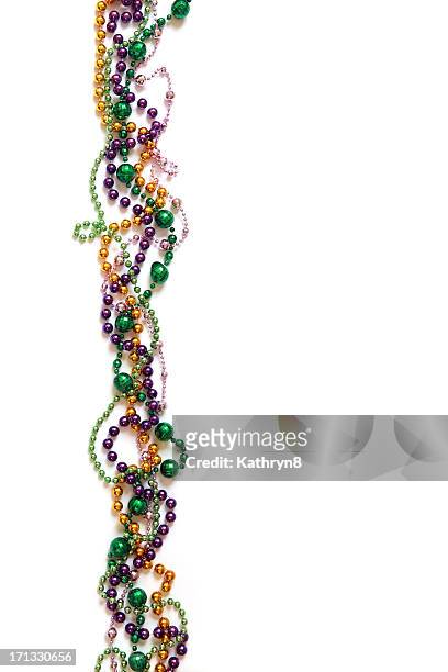 mardi gras beads - mardis gras stock pictures, royalty-free photos & images
