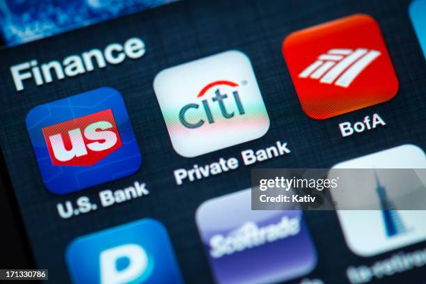 finance apps on apple iphone 4s screen - citigroup stock pictures, royalty-free photos & images