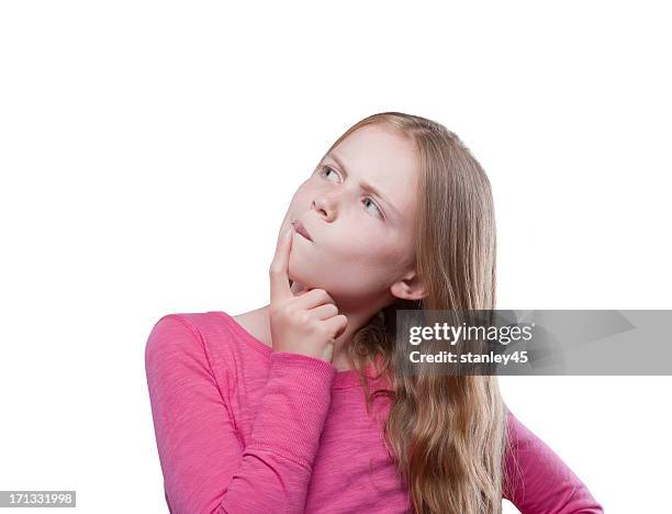 curious young girl looking up - raised eyebrows stock pictures, royalty-free photos & images