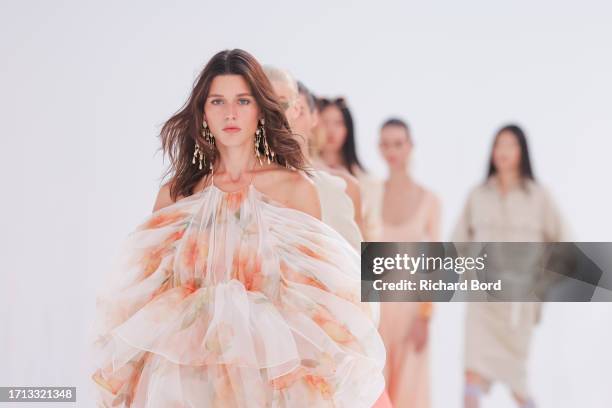 Models walk the runway during the Zimmermann Womenswear Spring/Summer 2024 show at palais de Tokyo as part of Paris Fashion Week on October 02, 2023...