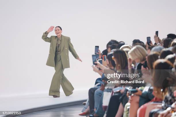 Designer Nicky Zimmermann acknowledges the audience during the Zimmermann Womenswear Spring/Summer 2024 show at Palais de Tokyo as part of Paris...