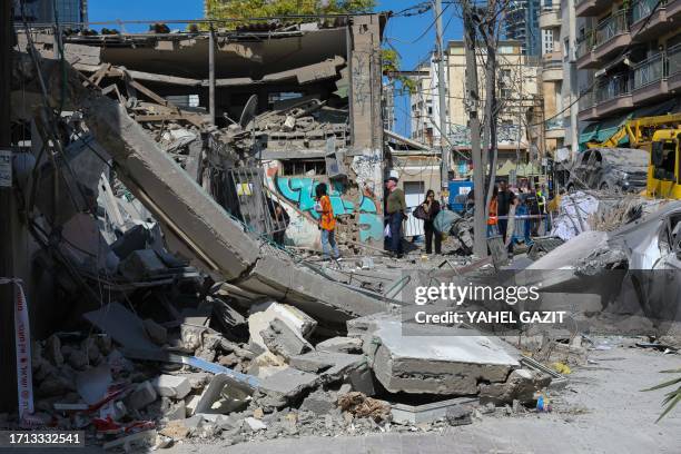 Tel Aviv, Israel. A building that collapsed following the fall of a rocket in south Tel Aviv, today October 8, 2023.