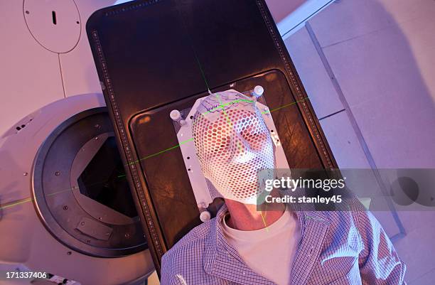 radiation therapy mask over a patient's face - laser face stock pictures, royalty-free photos & images