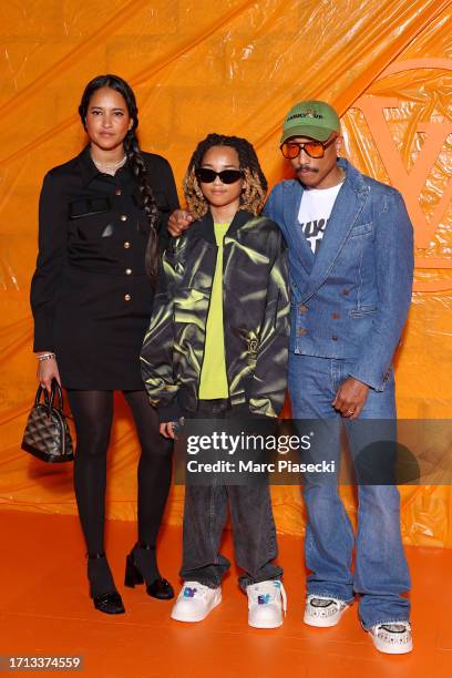 Helen Lasichanh, Rocket Ayer Williams and Pharrell Williams attend the Louis Vuitton Womenswear Spring/Summer 2024 show as part of Paris Fashion Week...