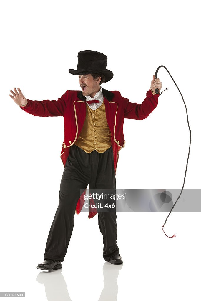 Ring master performing with a whip