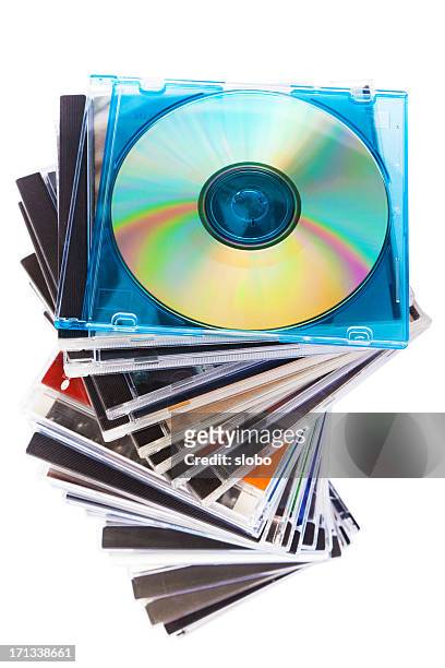 spiraling stack of music cds in jewel cases - rom stock pictures, royalty-free photos & images