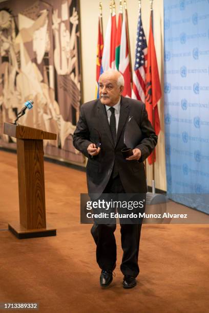 Ambassador Riyad Mansour, Permanent Observer of the State of Palestine to the United Nations exits the podium after speaking to reporters during a...