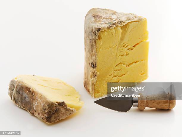 cloth wrapped english cheddar - cheddar cheese stock pictures, royalty-free photos & images