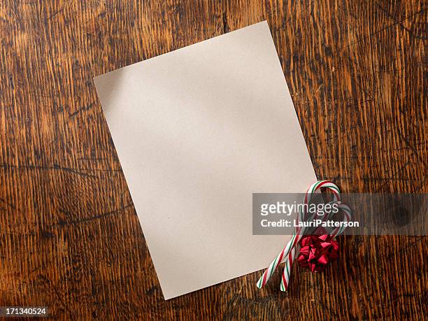 blank letter with candy canes - notepad table stock pictures, royalty-free photos & images