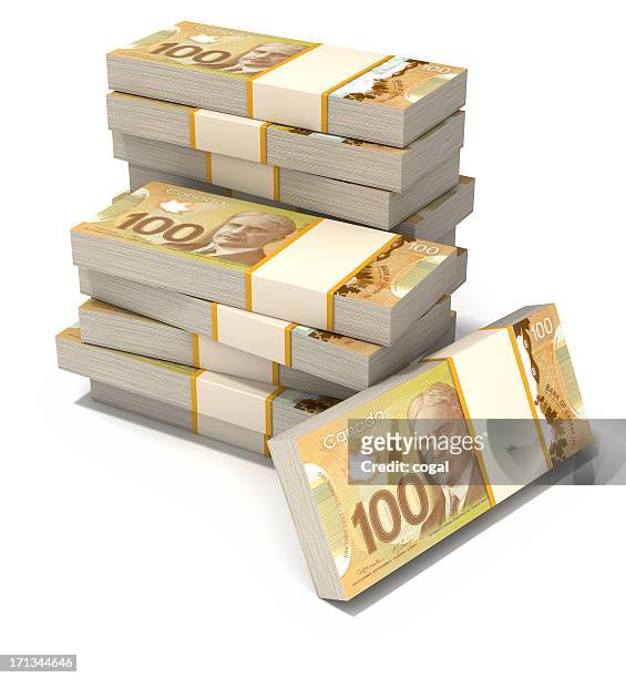 stack of new canadian dollar bills. - canada money stock pictures, royalty-free photos & images