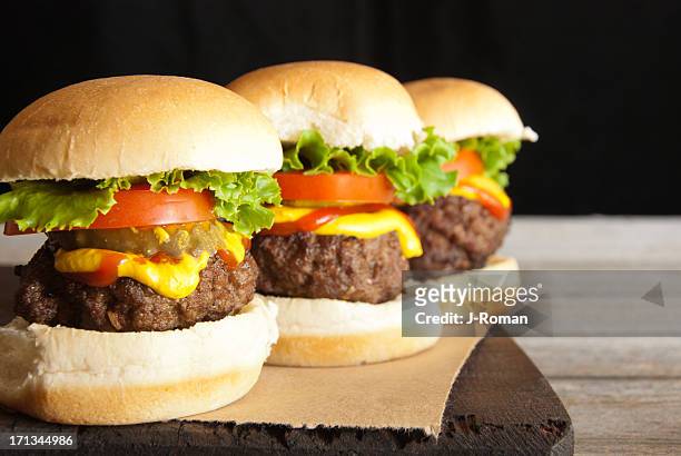 hamburger sliders in a row - little burger stock pictures, royalty-free photos & images