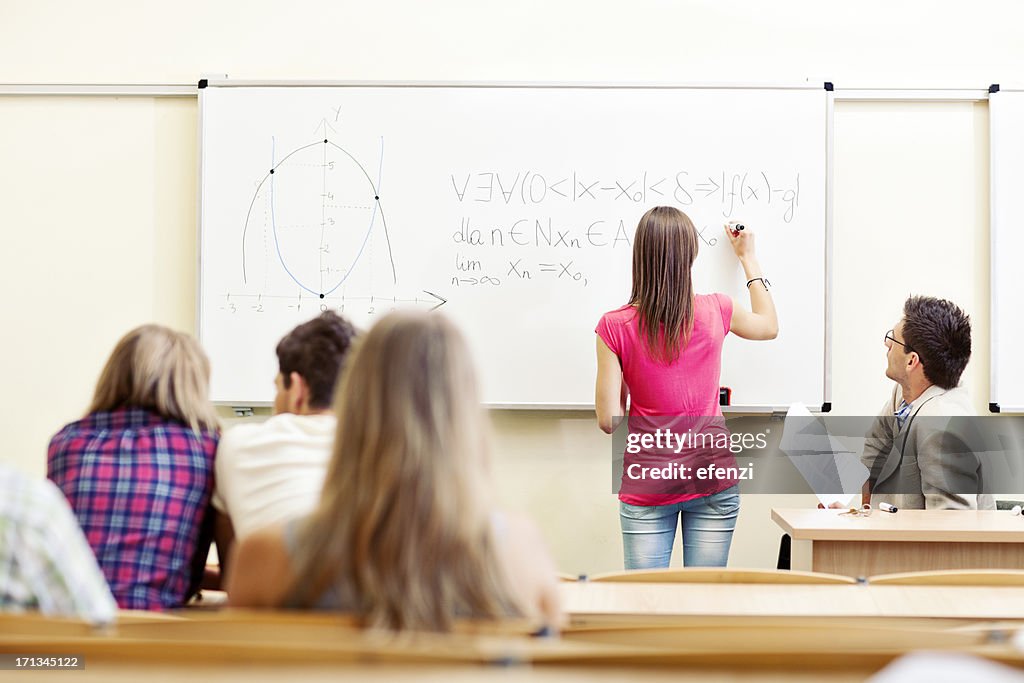 College Student Solving Math Problem High-Res Stock Photo - Getty Images