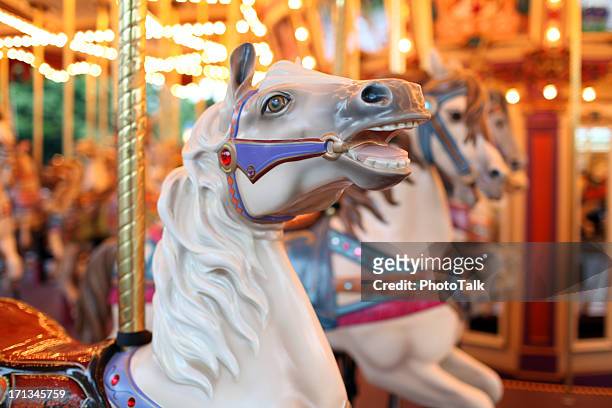 colorful holiday carousel horse - xxxlarge - circus lights stock pictures, royalty-free photos & images