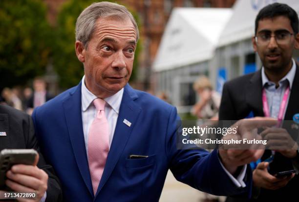 Former Leader of the Brexit Party, Nigel Farage attends the second day of the Conservative Party Conference on October 02, 2023 in Manchester,...