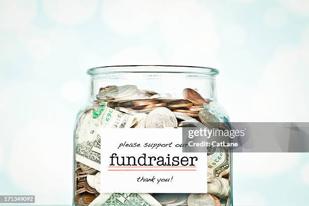 fundraising collection jar - fundraising stock pictures, royalty-free photos & images