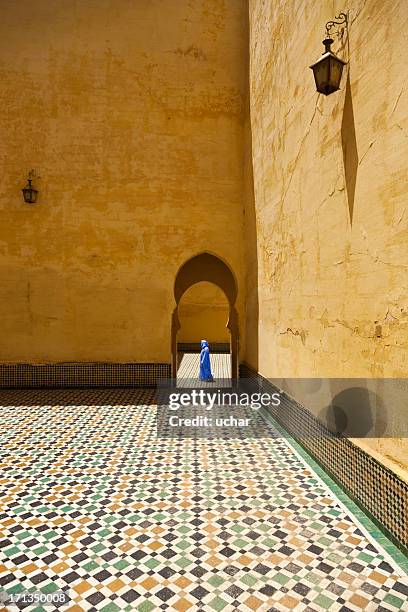 morocco in mosque man walking - meknes bildbanksfoton och bilder