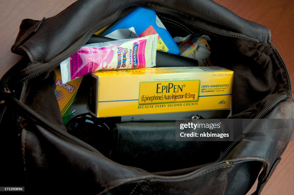 Open purse of mother whose child has food allergies