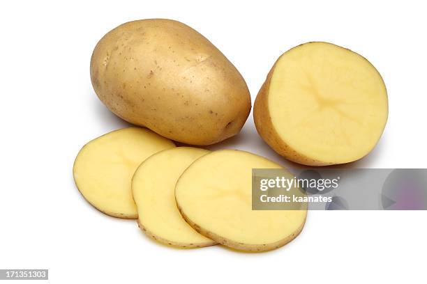 raw potato full body and freshly cut isolated on white - wedge stockfoto's en -beelden