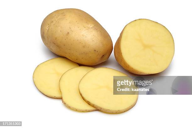 raw potato full body and freshly cut isolated on white - full body isolated bildbanksfoton och bilder