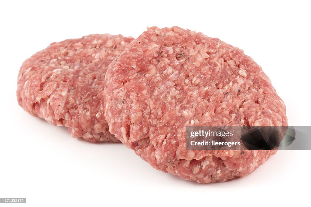 Two delicious angus beef burgers isolated on a white background