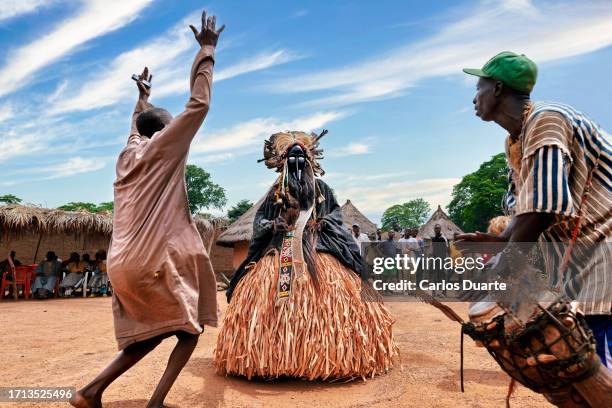 celebration of dances and masks in the town of godefouma in the ivory coast - ivory coast town bildbanksfoton och bilder