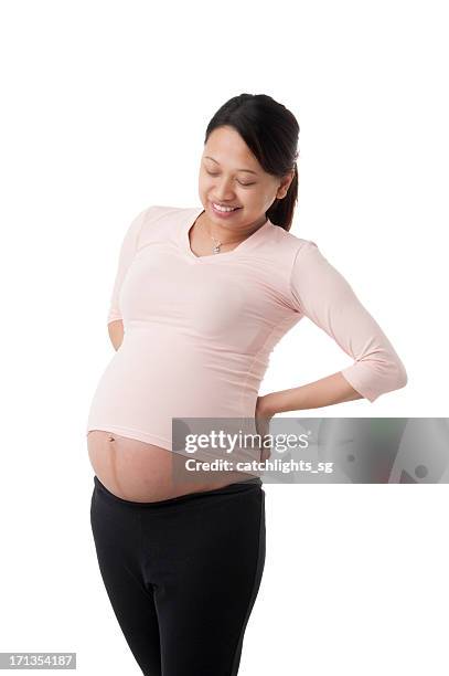 pregnant asian woman - pregnant isolated stock pictures, royalty-free photos & images