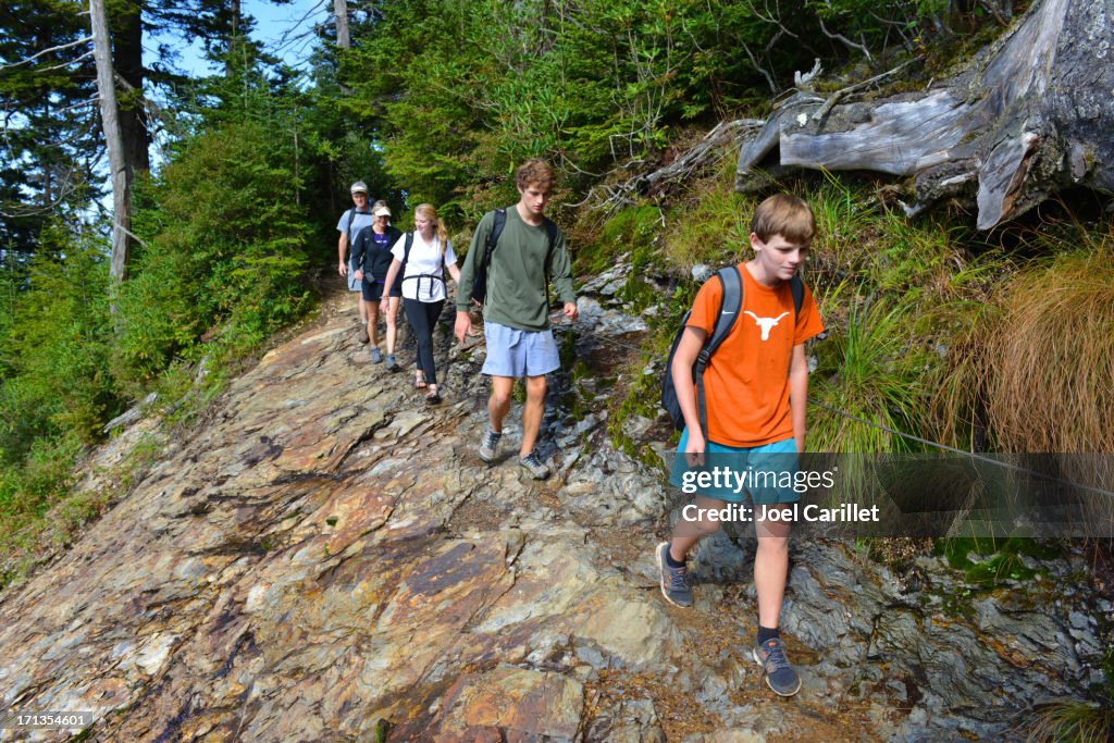 Family hiking in national park