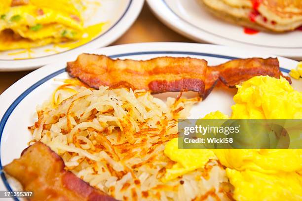 generous breakfast - hash brown stock pictures, royalty-free photos & images