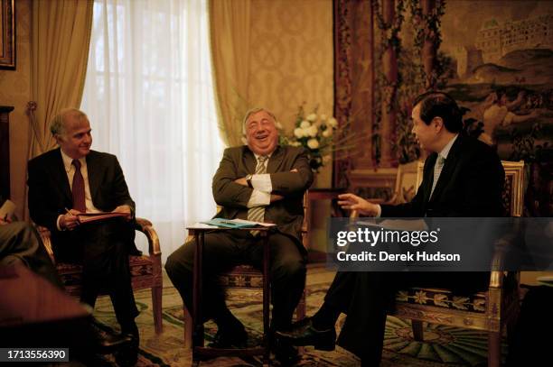 Gérald Larcher, president of the French Senate, laughing during a meeting with unnamed dignitaries in the office of the president of the French...