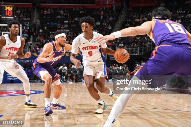 Ausar Thompson of the Detroit Pistons drives to the basket during the game against the Phoenix Suns on October 8, 2023 at Little Caesars Arena in...