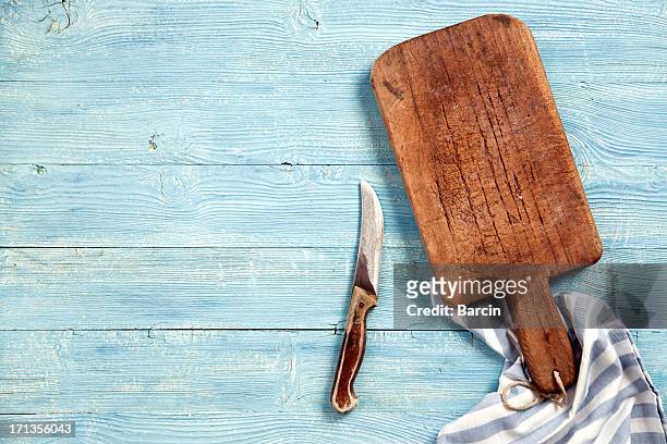 old cutting board and knife - cutting board stock pictures, royalty-free photos & images