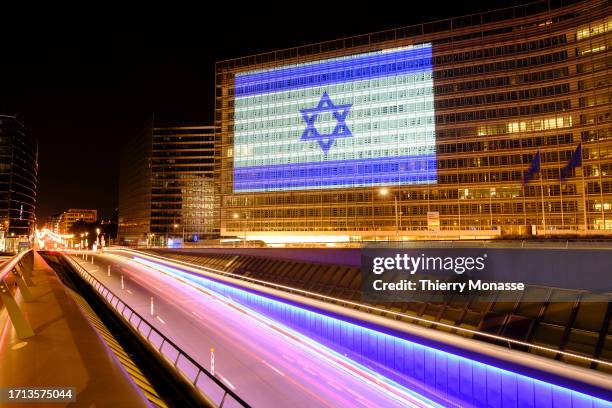 The Israeli Flag is projected onto the Berlaymont, the EU Commission headquarters on October 8, 2023 in Brussels, Belgium. EU States and the USA...