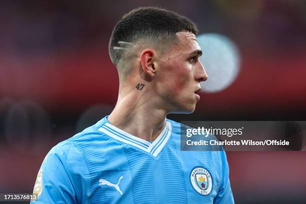 Detailed view of Phil Foden of Manchester City's '47' tattoo during the Premier League match between Arsenal FC and Manchester City at Emirates...