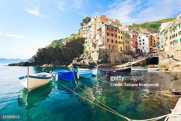 a view from the water of riomaggiore, cinque terre - italia stock pictures, royalty-free photos & images