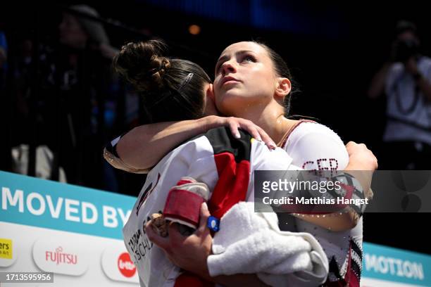 Pauline Schaefer-Betz and Sarah Voss of Team Germany react during the Women's Qualifications on Day Three of the 2023 Artistic Gymnastics World...