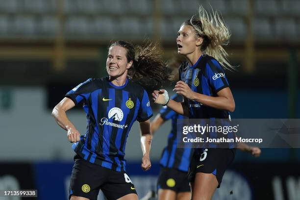 Sofie Junge Pedersen of FC Internazionale celebrates with team mates Michela Cambiaghi and Frederikke Thogersen after scoring to level the game at...