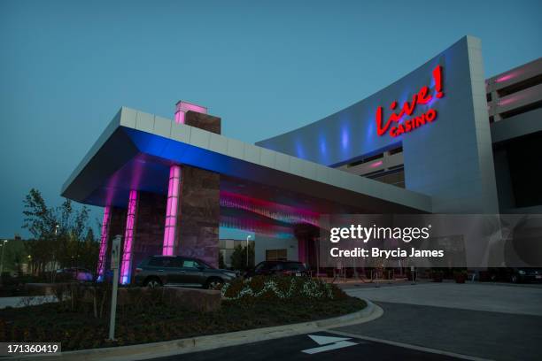 main entrance to the maryland live! casino at dusk - entrance sign stock pictures, royalty-free photos & images