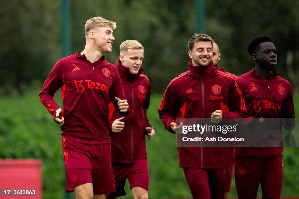 Rasmus Hojlund, Donny van de Beek, Mason Mount, Sofyan Amrabat and Omari Forson of Manchester United in action during a first team training session...